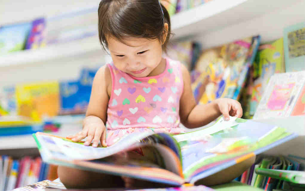 child in library