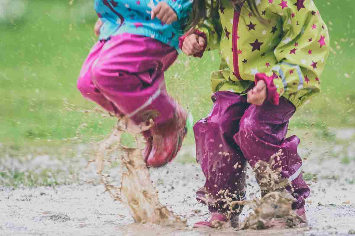 Rainy day activities for kids jumping in puddles